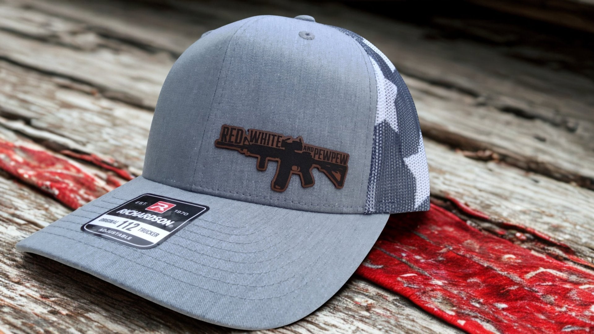 red white and pewpew patch on a stars and stripes trucker hat, Hollarwood Outfitters