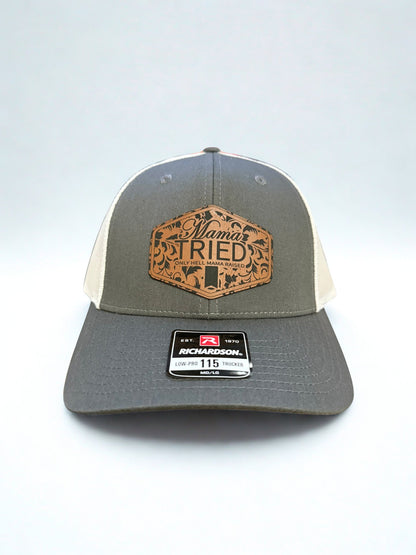 Heather/White trucker hat with a Mama Tried Leather Patch Hollarwood Outfitters